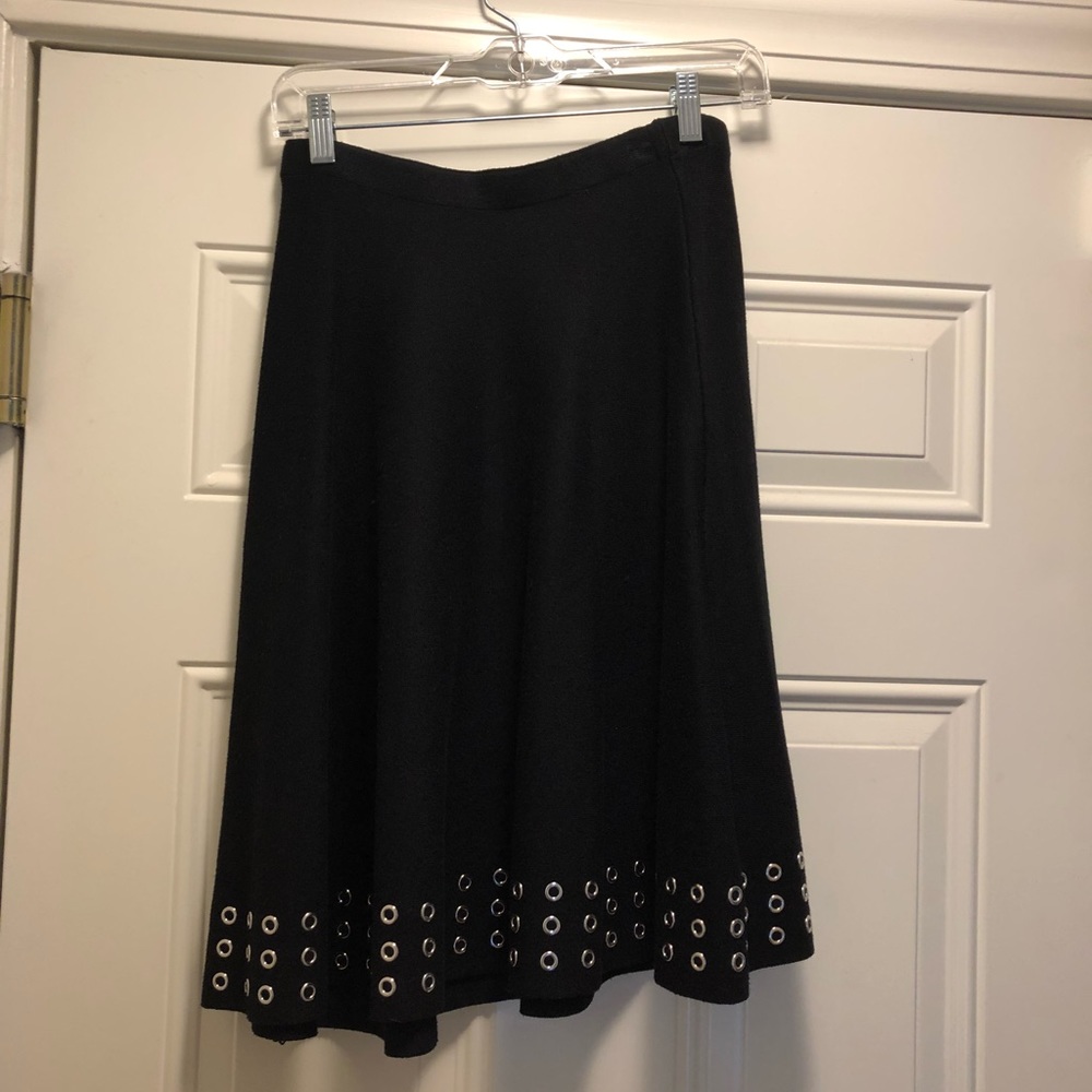 Black skirt with metal grommets